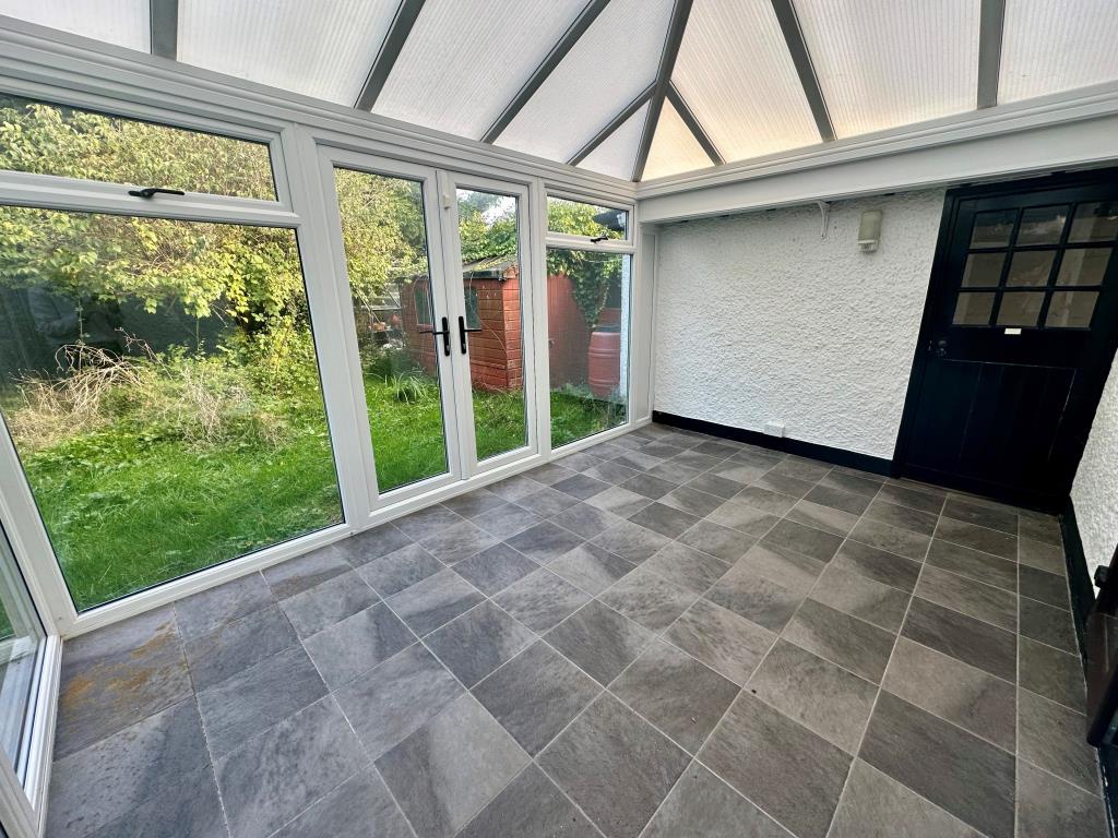 Lot: 129 - FOUR-BEDROOM DETACHED HOUSE FOR REFURBISHMENT - Conservatory